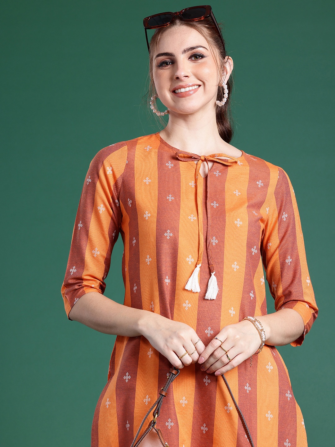 

Sangria Striped Tie-Up Neck Pure Cotton Kurta, Rust