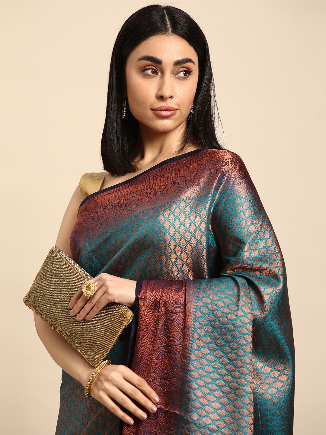 

Kalyan Silks Ethnic Motifs Zari Silk Blend Kasavu Saree, Turquoise blue