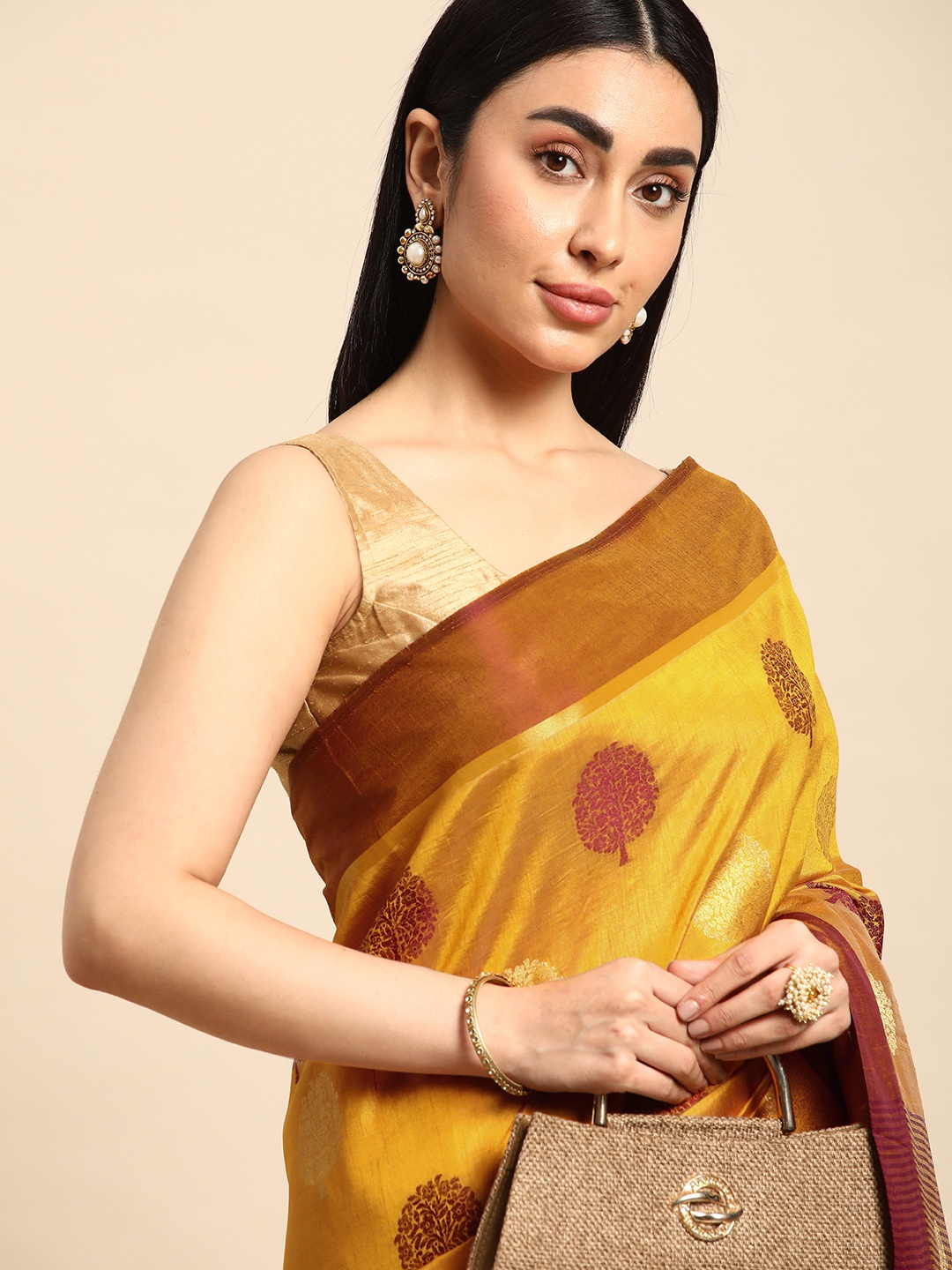 

Kalyan Silks Floral Woven Design Semi Tussar Silk Saree, Mustard