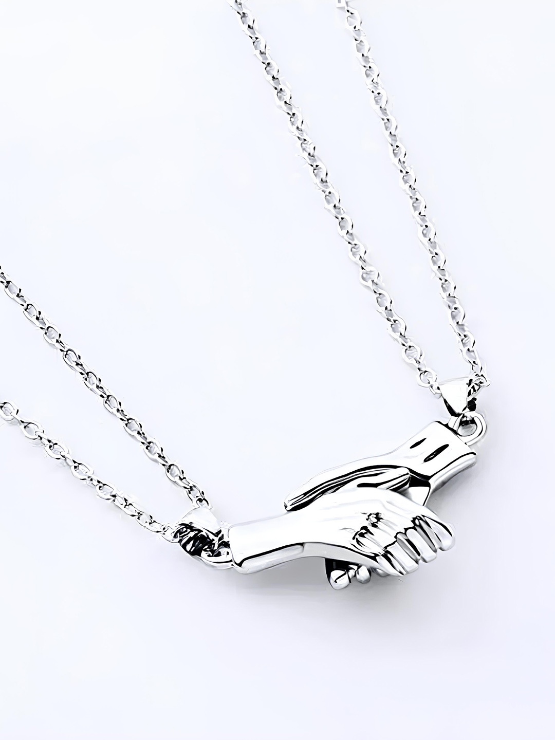

KARISHMA KREATIONS Silver-Plated Hold Hand Magnetic Couple Lover Pendant With Chain
