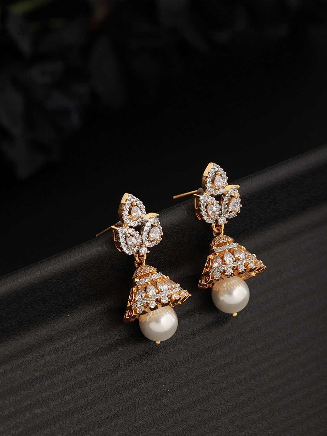 

Saraf RS Jewellery Gold-Plated American Diamond Studded Jhumkas