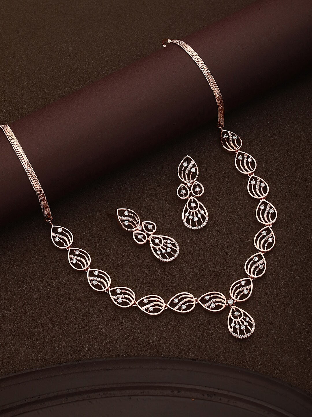 

Saraf RS Jewellery American Diamond Stone Studded Jewellery Set, Rose gold