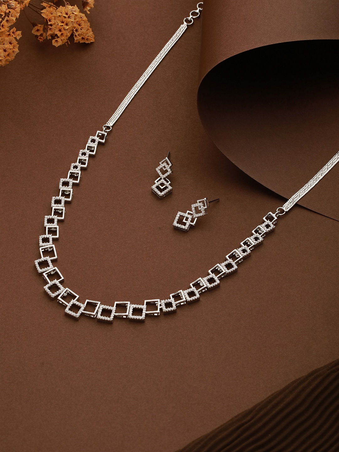 

Saraf RS Jewellery Silver Plated American Diamond Stone Studded Jewellery Set