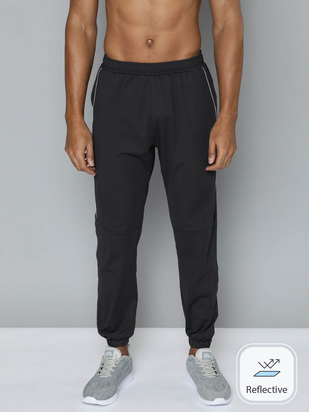 

HRX by Hrithik Roshan Men Solid Regular Fit Rapid-Dry Joggers, Black