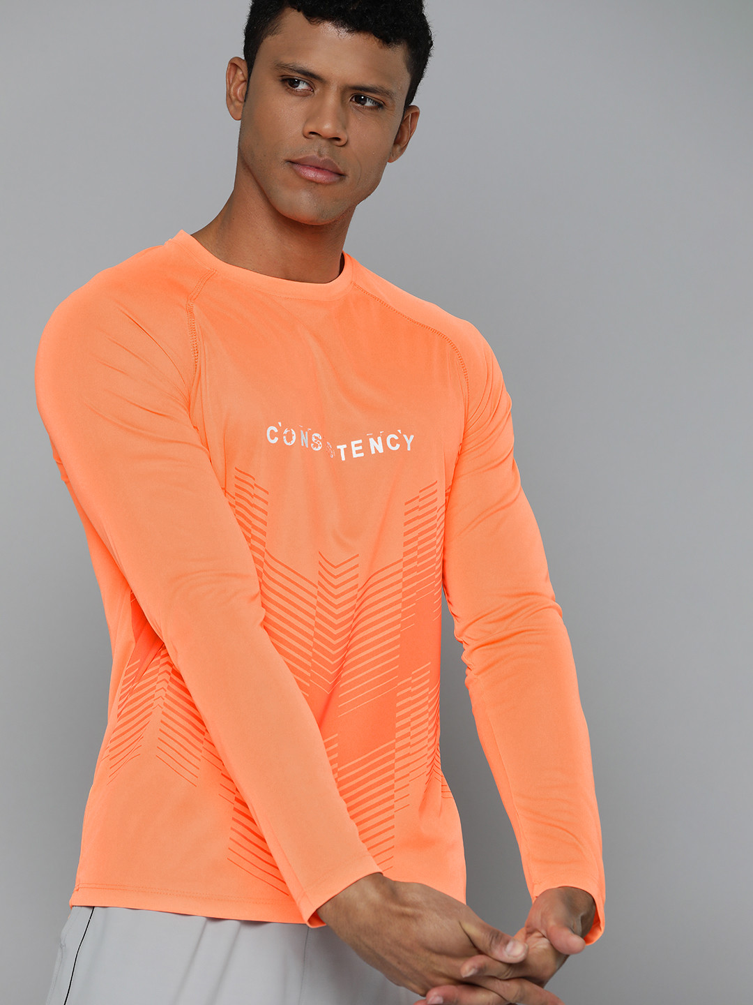 

HRX by Hrithik Roshan Men Typography Printed T-shirt, Orange