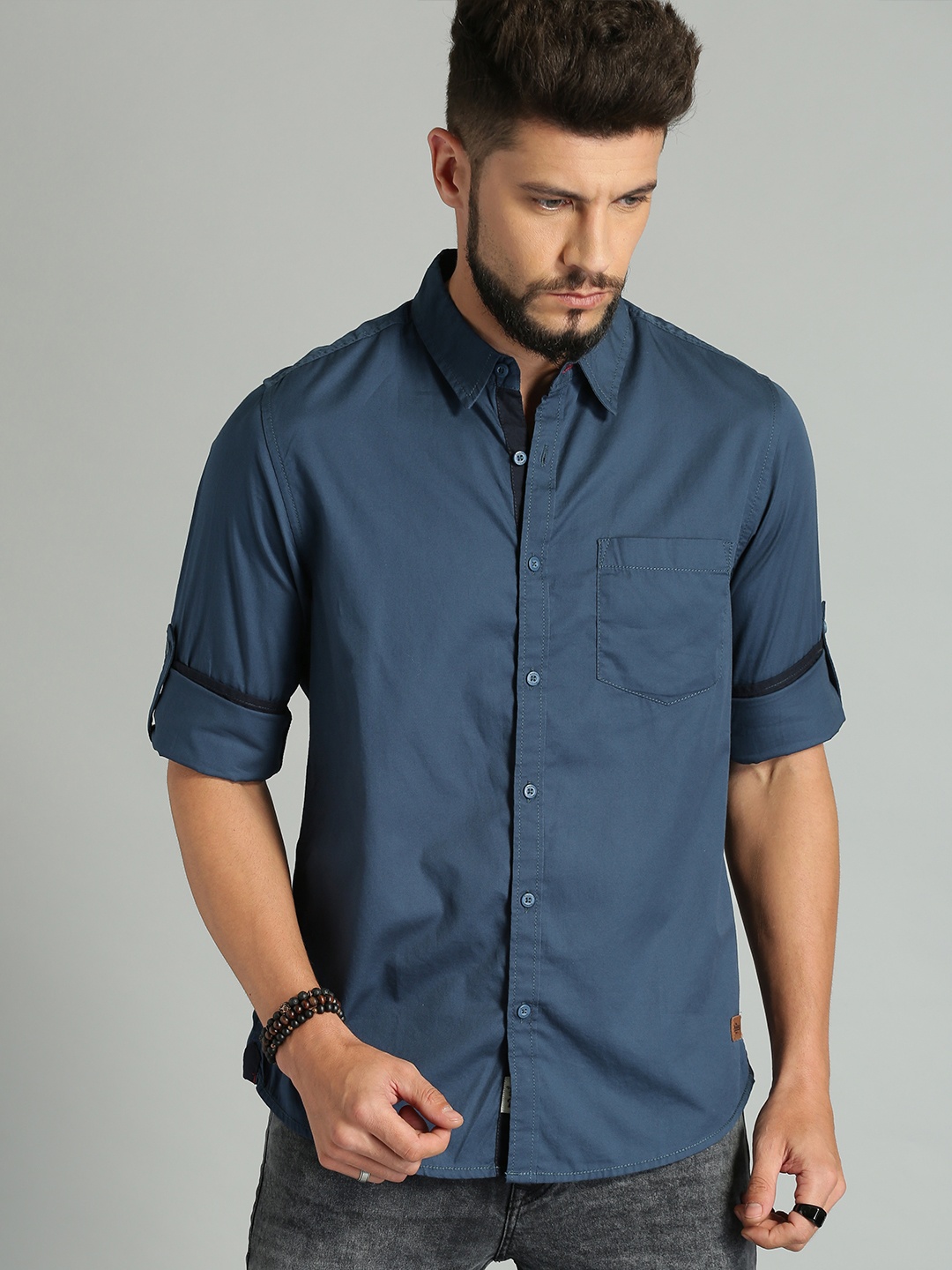 

Roadster Men Teal Blue Fit Solid Sustainable Casual Shirt