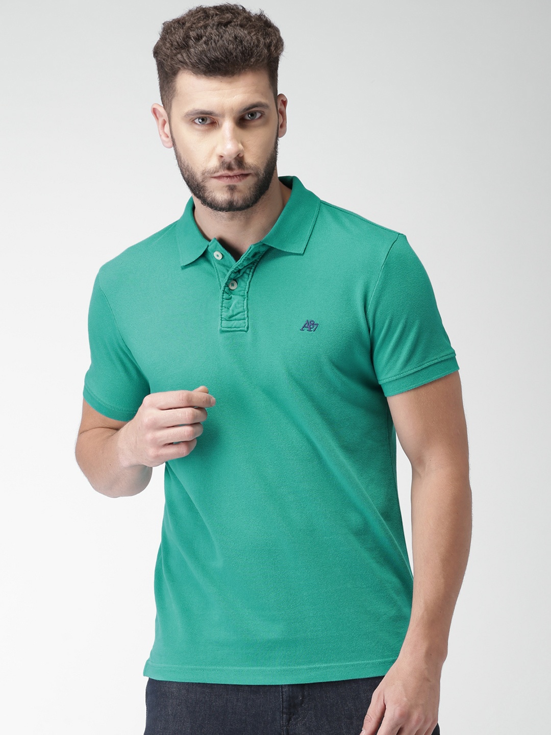 

Aeropostale Men Teal Green Solid Polo Collar T-shirt