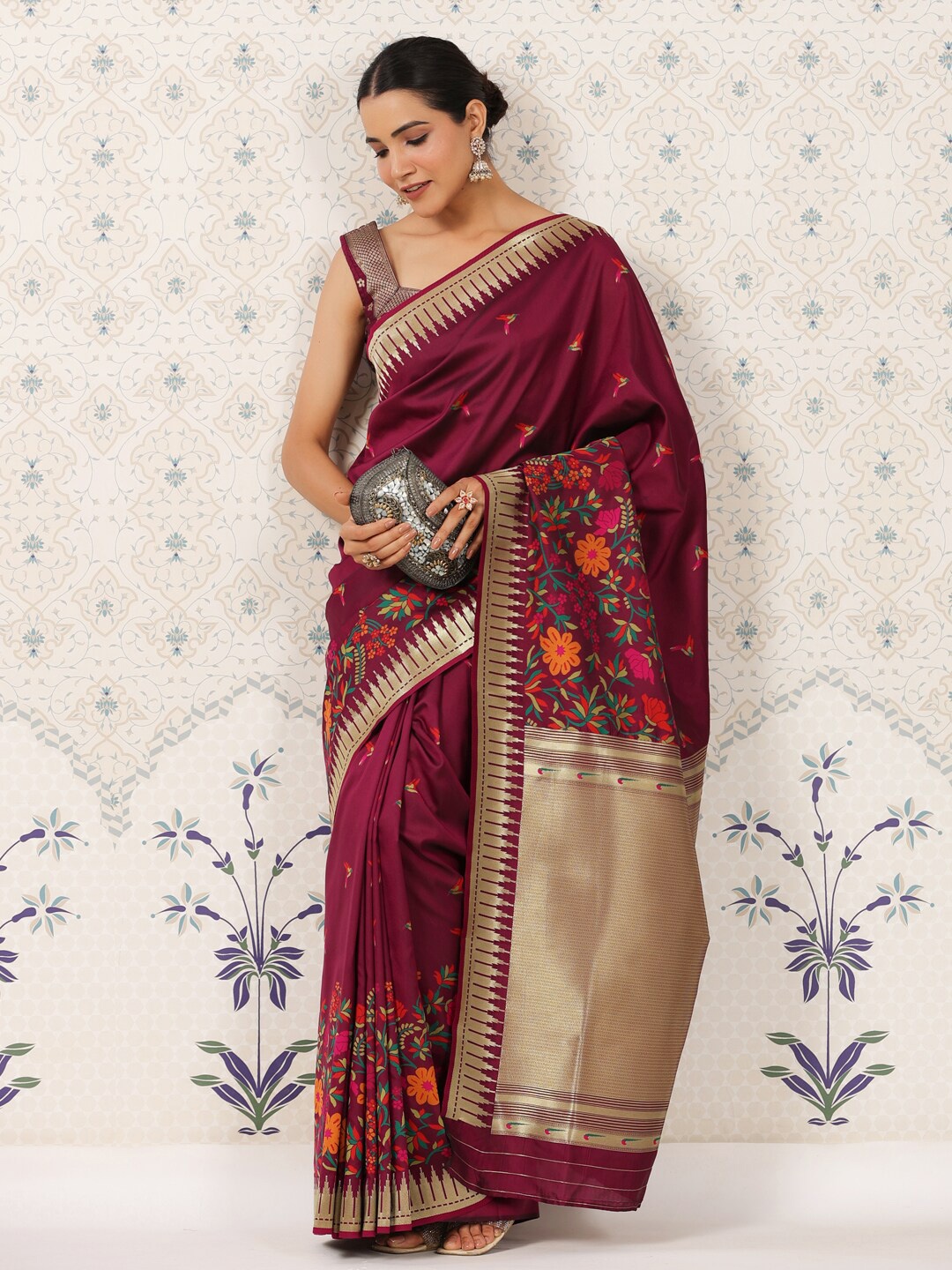 

Ode by House of Pataudi Burgundy & Green Floral Printed Zari Banarasi Saree