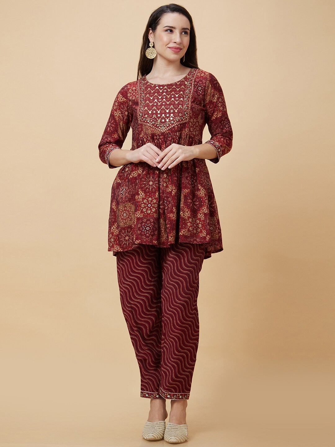 

Globus Maroon Ethnic Motifs Printed Regular Thread Work A-Line Kurta with Trousers