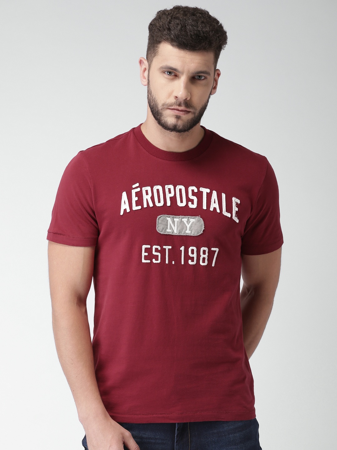 

Aeropostale Men Red Self Design Round Neck Pure Cotton T-shirt