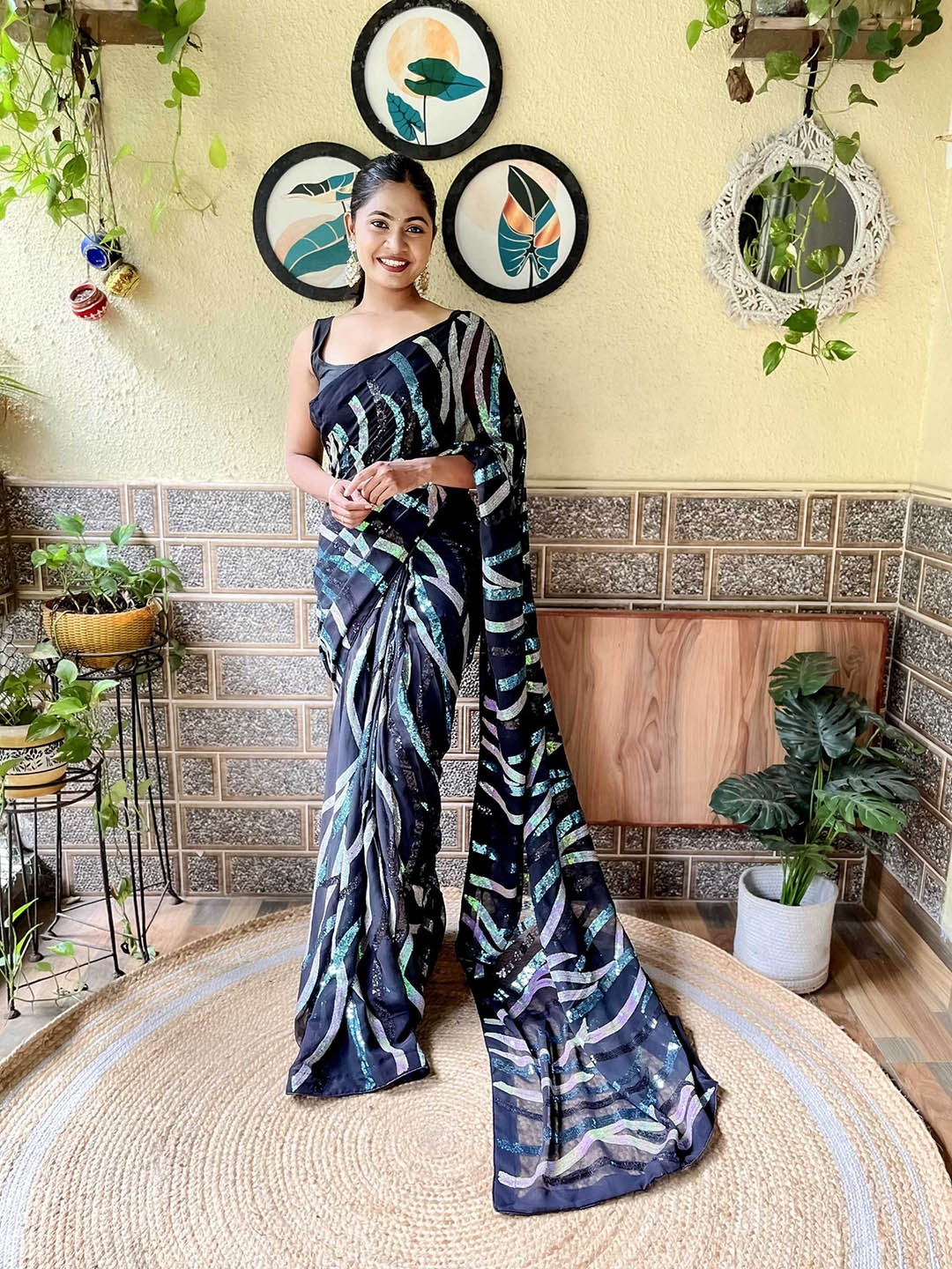 

Mitera Sequinned Embellished Poly Georgette Saree, Black
