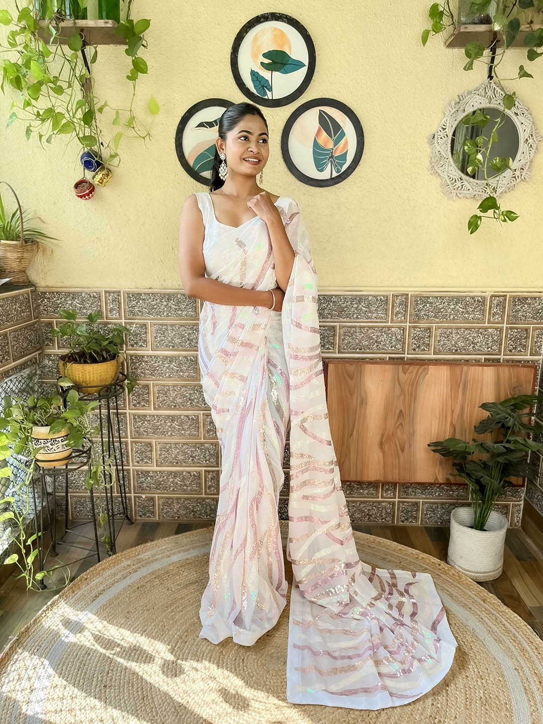 

Mitera White & Pink Embellished Sequinned Saree