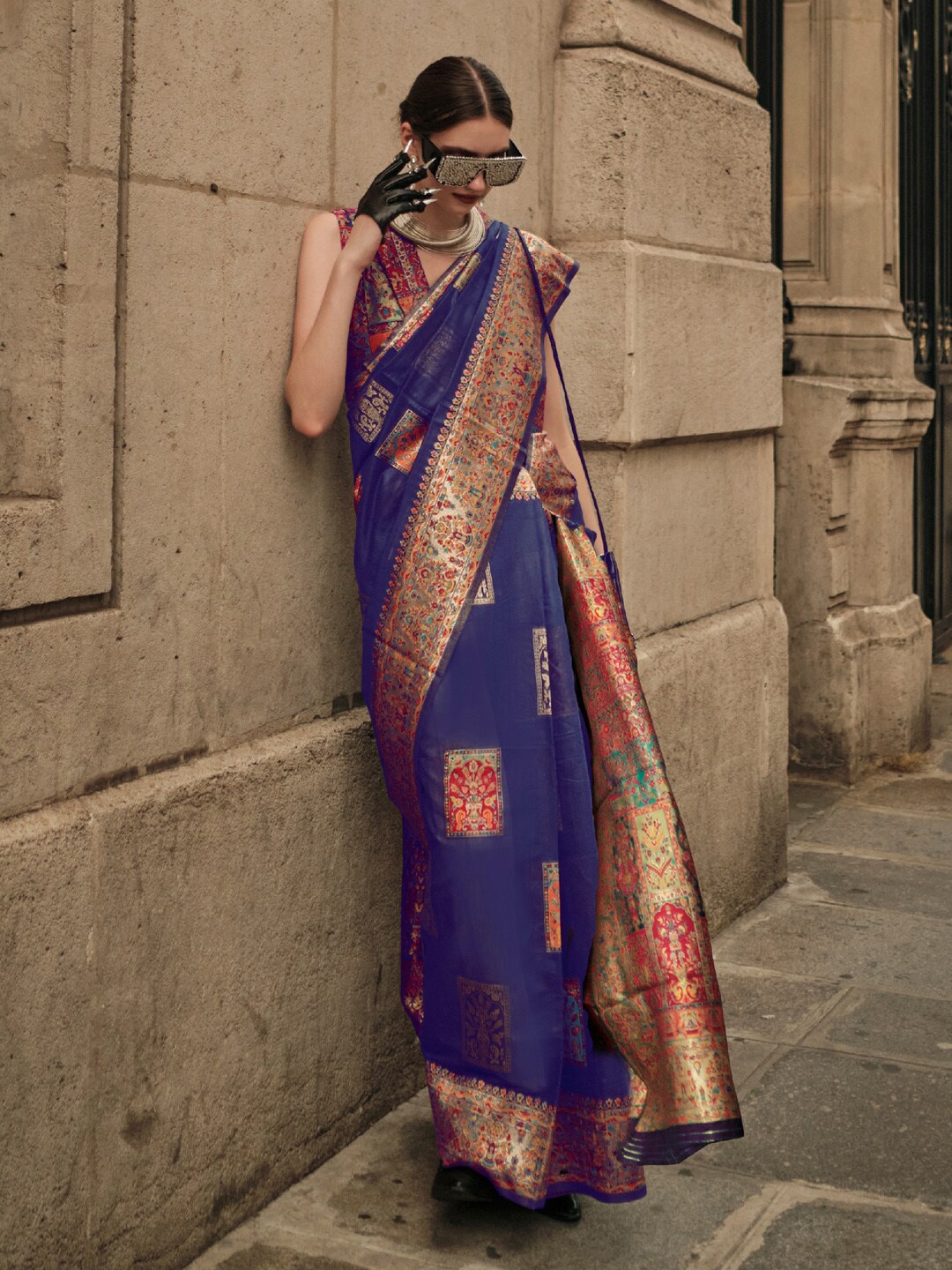 

Mitera Blue & Red Ethnic Motifs Zari Banarasi Saree