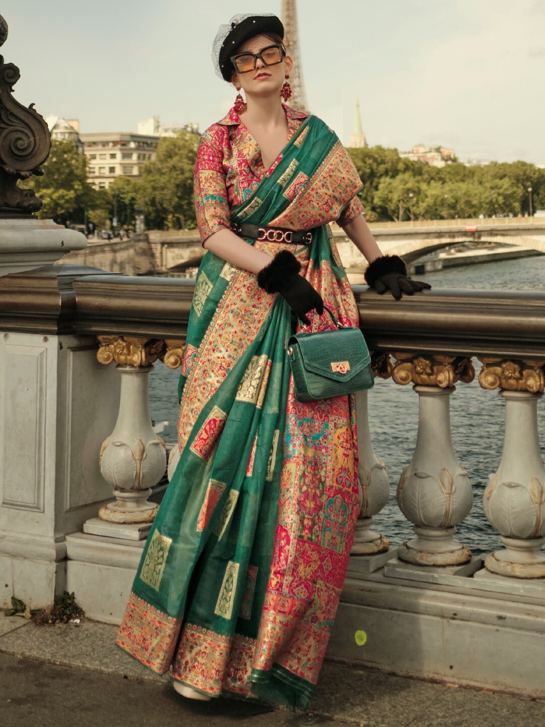 

Mitera Green & Orange Ethnic Motifs Woven Design Zari Banarasi Saree