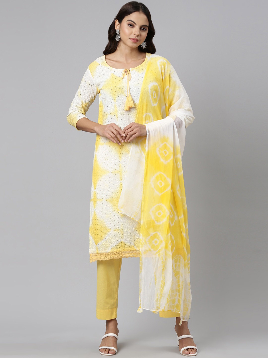 

Neerus Dyed Tie-Up Neck Thread Work Pure Cotton Kurta with Trousers & Dupatta, Yellow