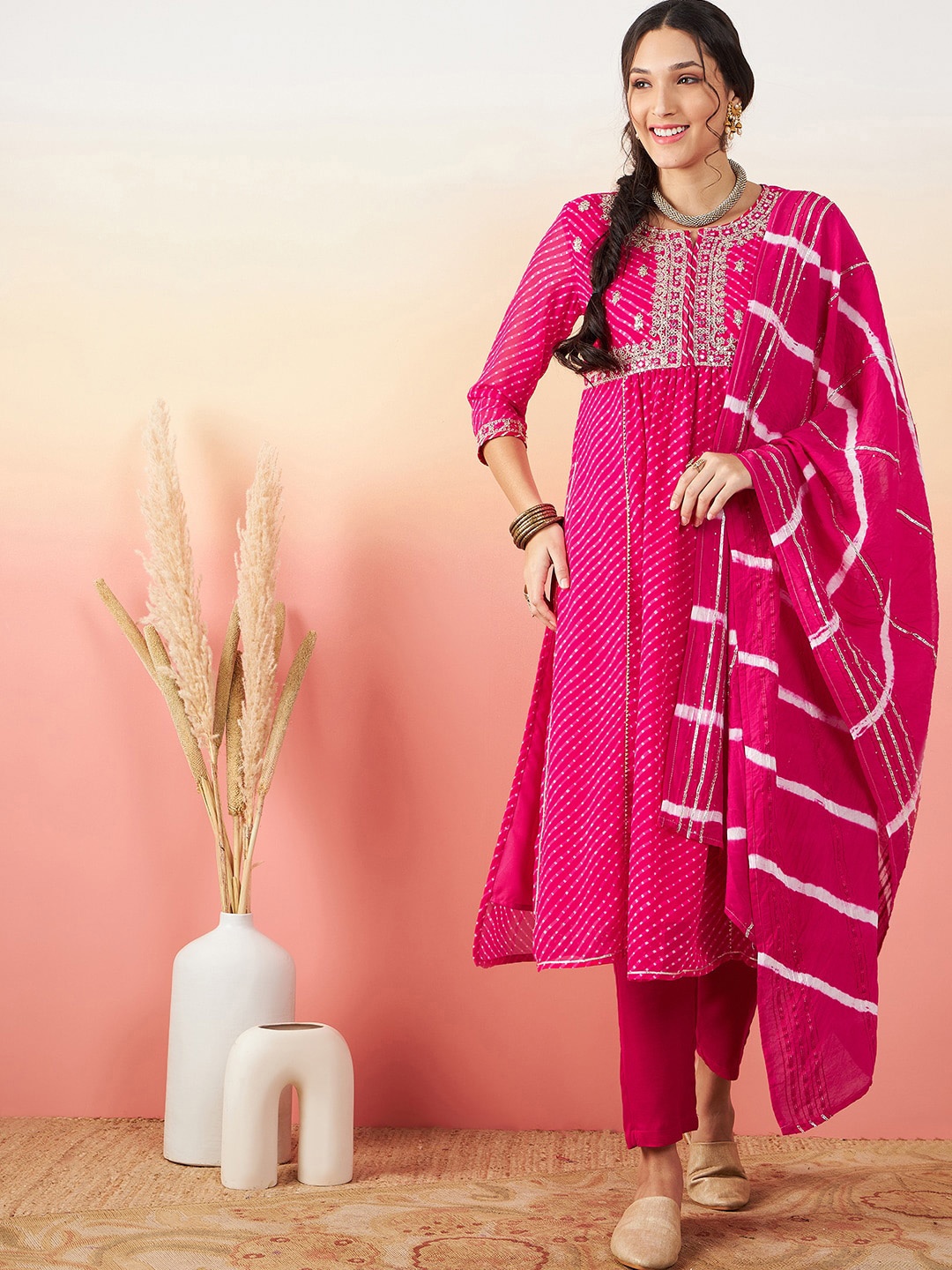 

Sangria Pink Leheriya Printed A-Line Kurta With Trouser & Dupatta