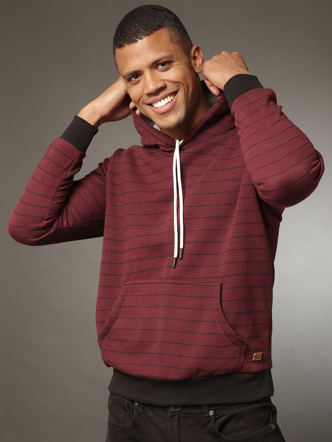 

Campus Sutra Men Maroon Striped Cotton Hooded Pullover Sweatshirt