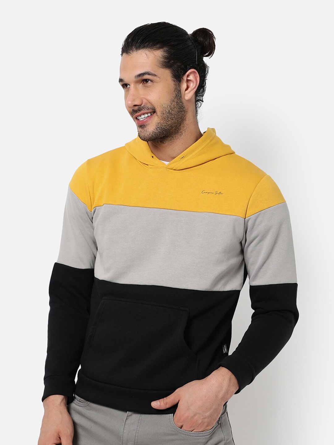 

Campus Sutra Colourblocked Hooded Cotton Pullover, Yellow