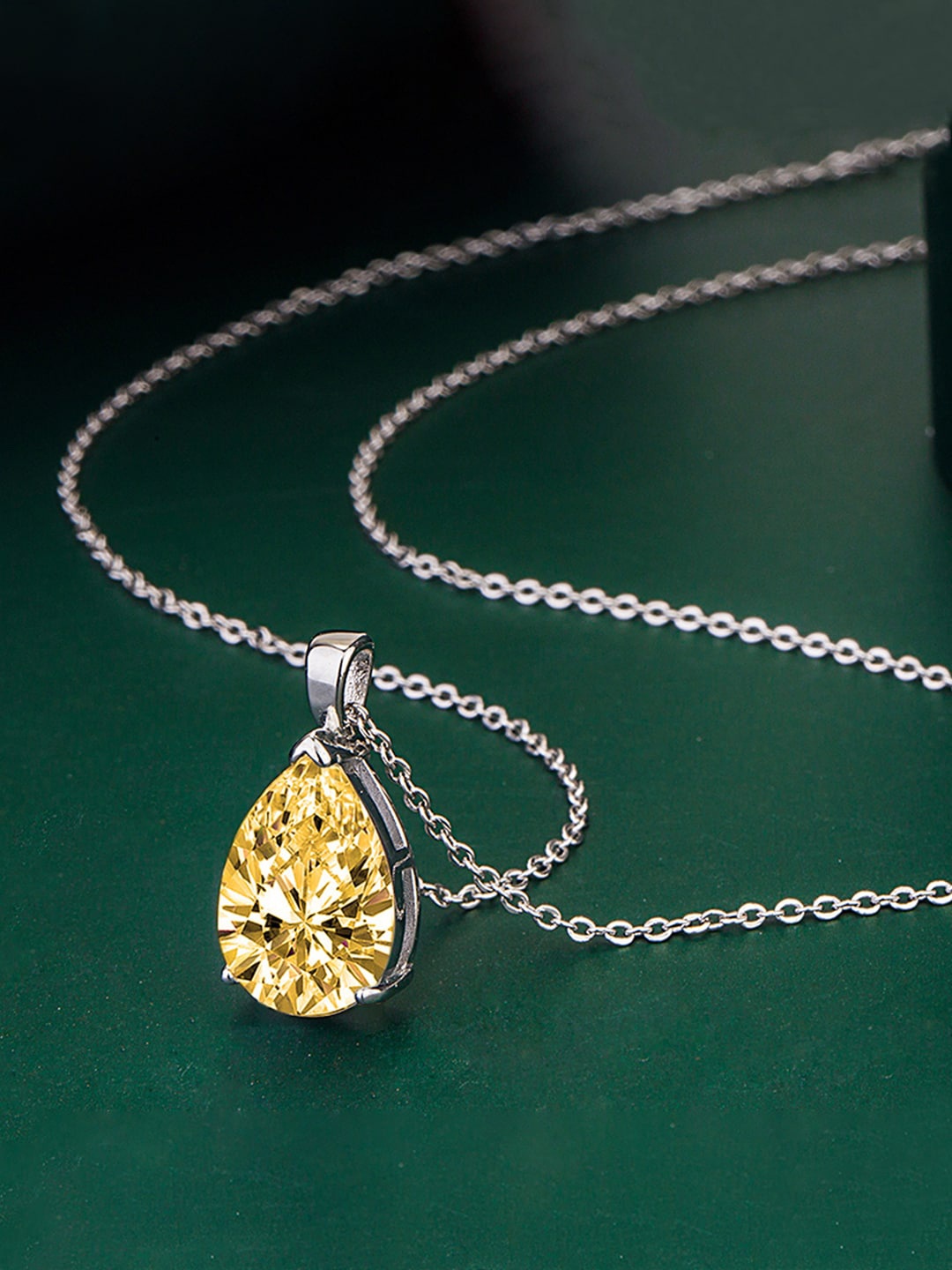 

Designs & You Silver-Plated CZ-Studded Teardrop Shaped Pendant With Chain