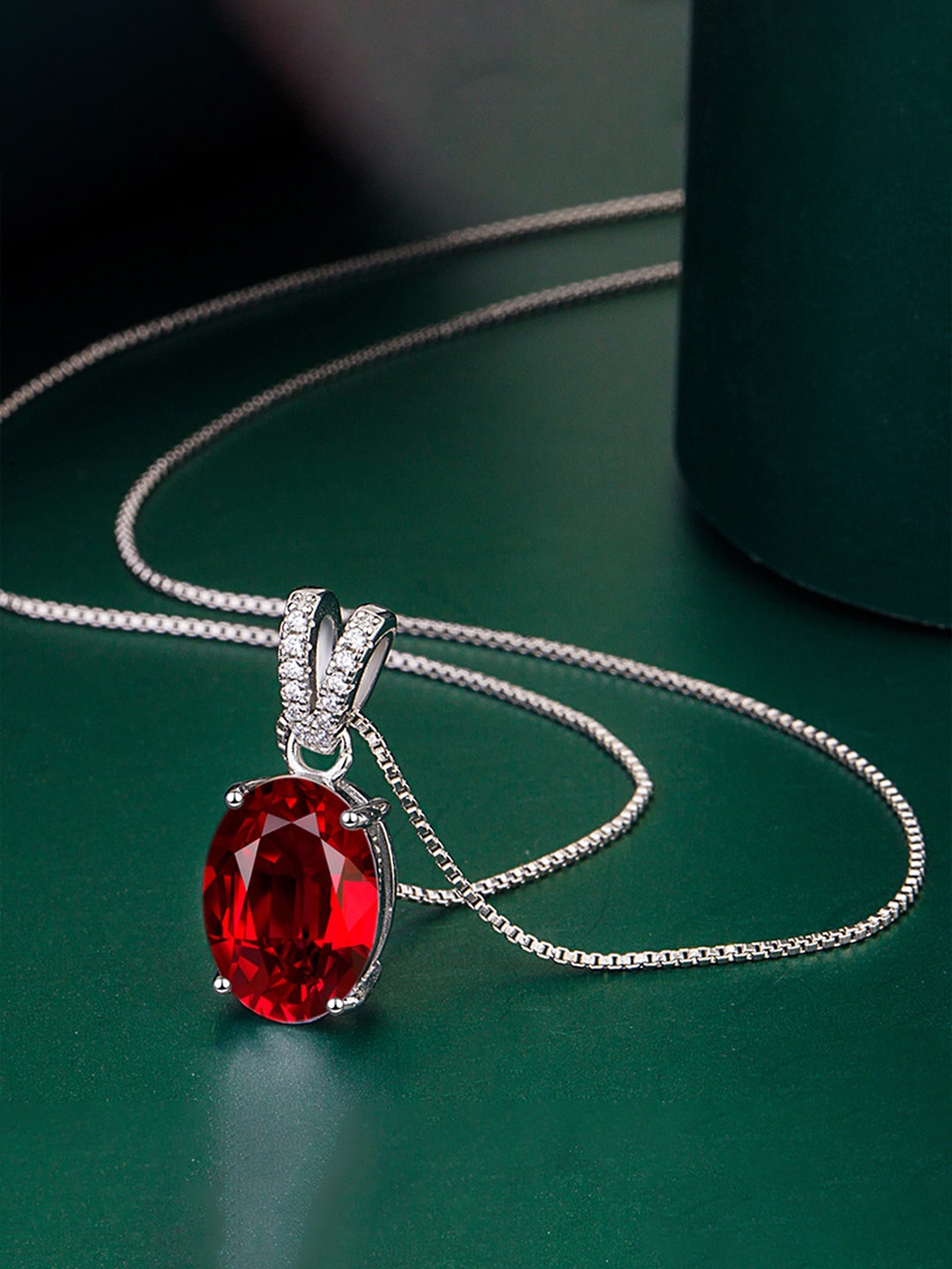 

Designs & You Silver-Plated CZ-Studded Oval Pendant With Chain