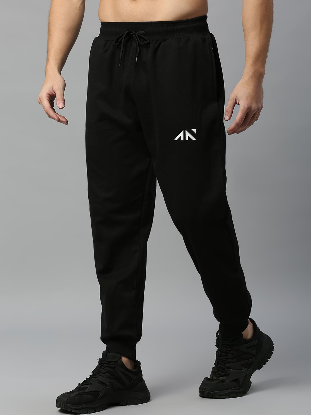 

AESTHETIC NATION Men Mid Rise Relaxed Fit Joggers, Black