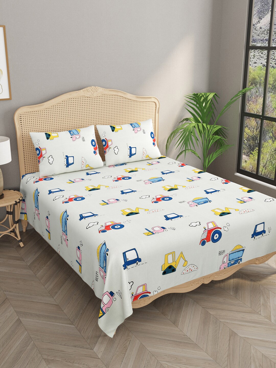 

Gulaab Jaipur Cream Cartoon Characters Cotton 210 TC King Bedsheet with 2 Pillow Covers