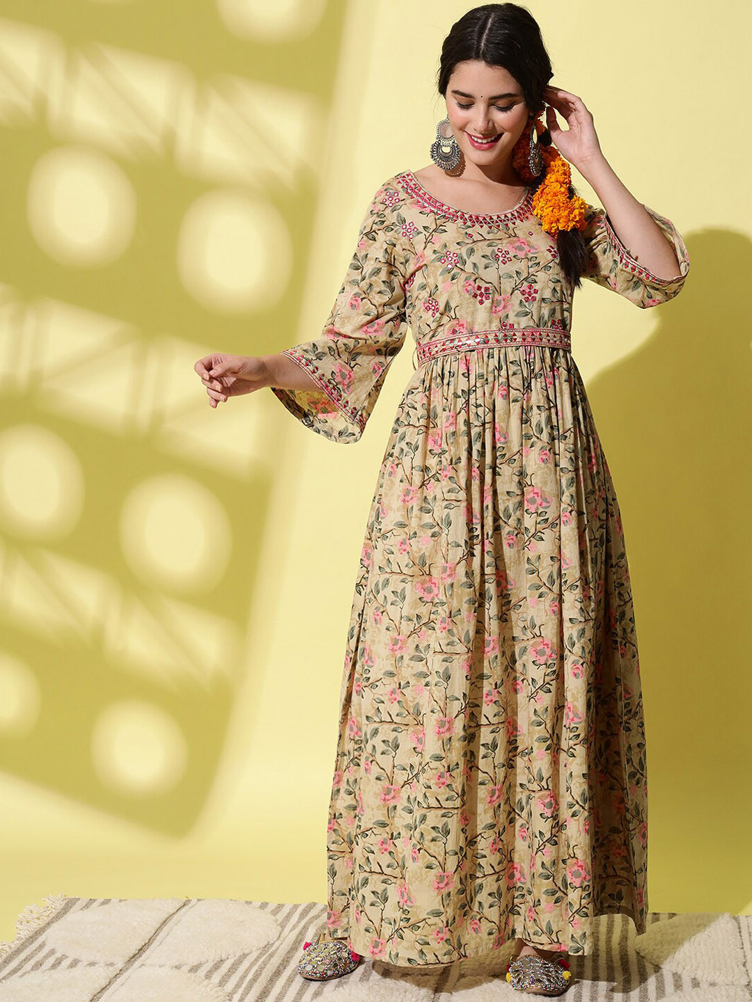 

AAYUMI Floral Printed Flared Sleeves Mirror Work Pure Cotton A-Line Kurta, Yellow