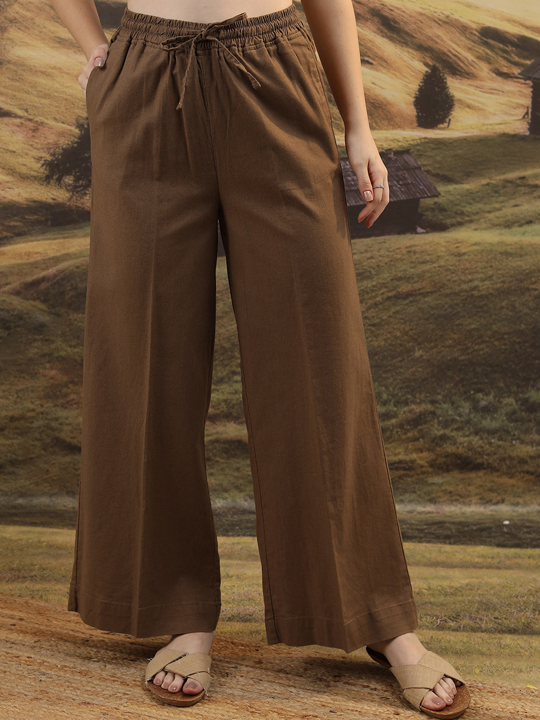 

Tokyo Talkies Women Brown Mid Rise Cotton Flared Parallel Trousers