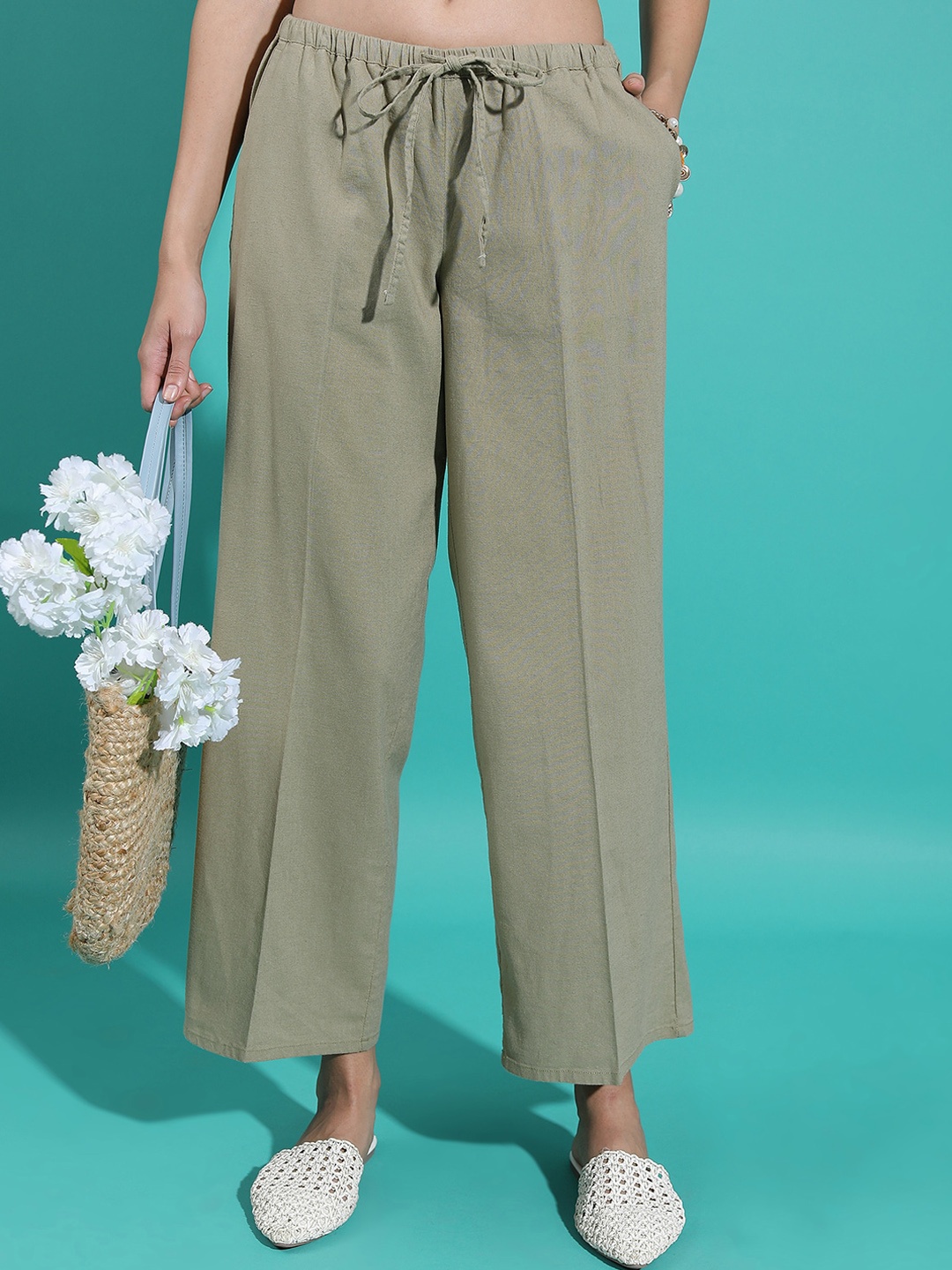 

Tokyo Talkies Women Olive Green Mid Rise Cotton Flared Parallel Trousers
