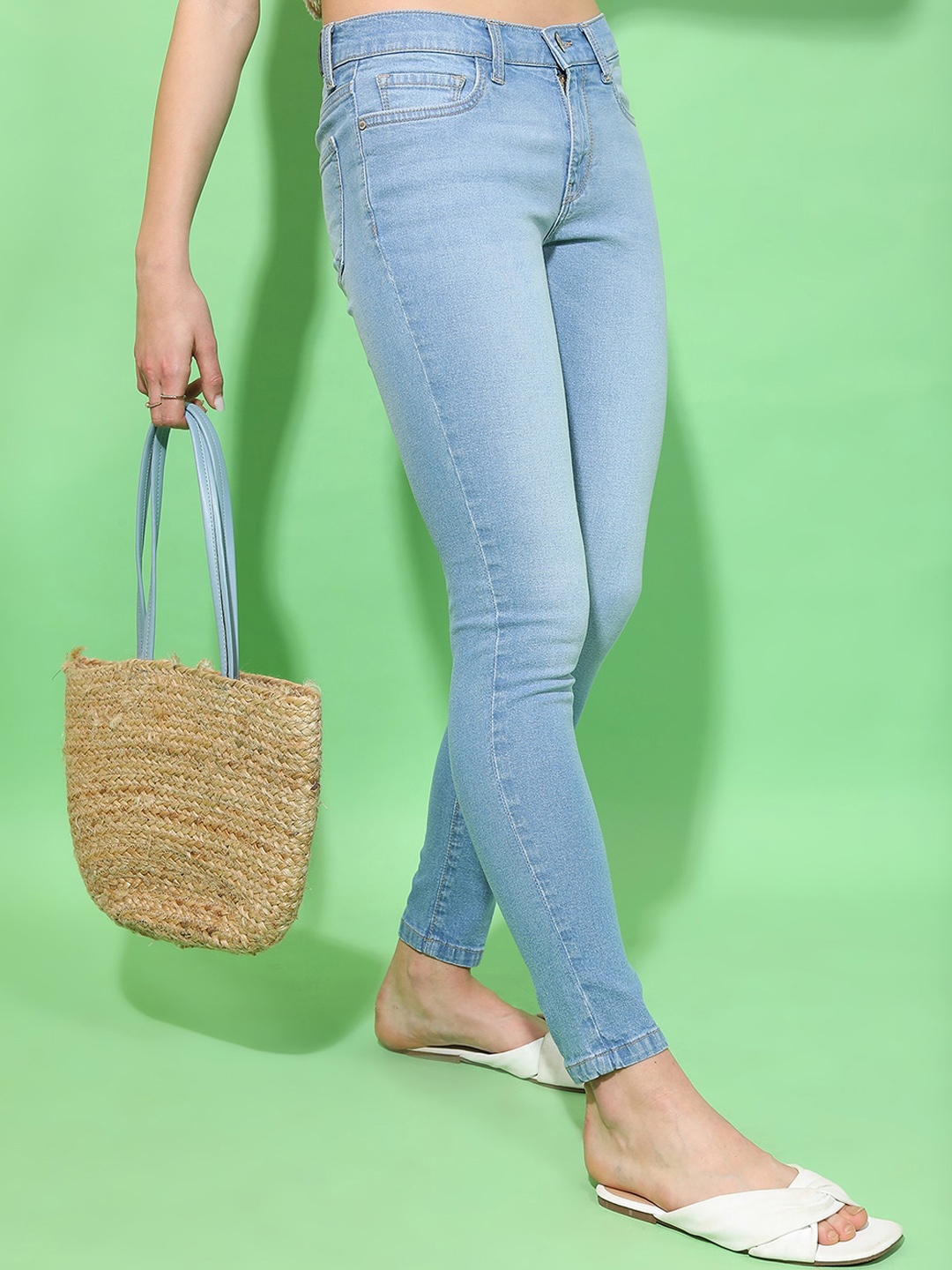 

Tokyo Talkies Women Blue Mid Rise Skinny Fit Low Distress Light Fade Cotton Jeans
