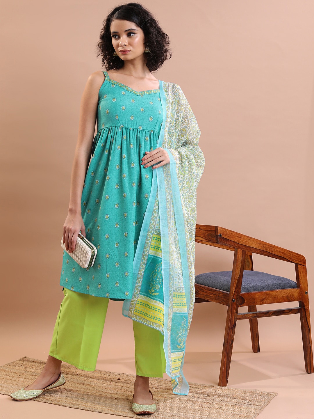 

Vishudh Turquoise Blue Ethnic Motifs Printed Empire Kurta With Palazzos & Dupatta