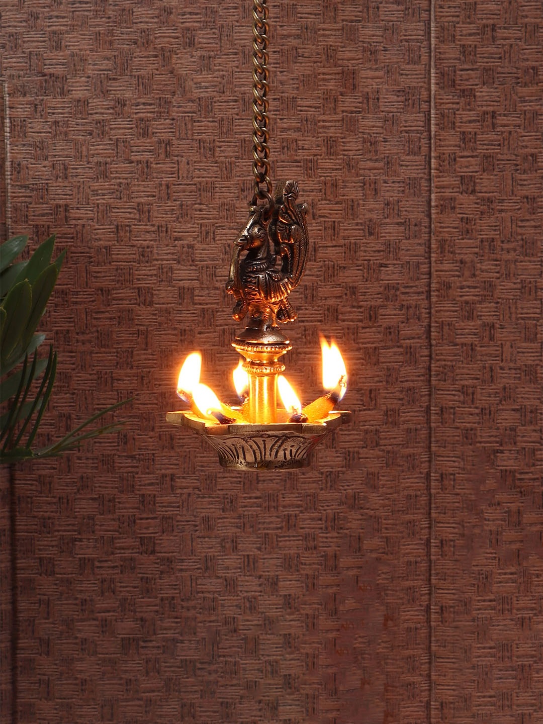 

Two Moustaches Gold-Toned Ethnic Peacock Design 5 Wick Brass Hanging Diya