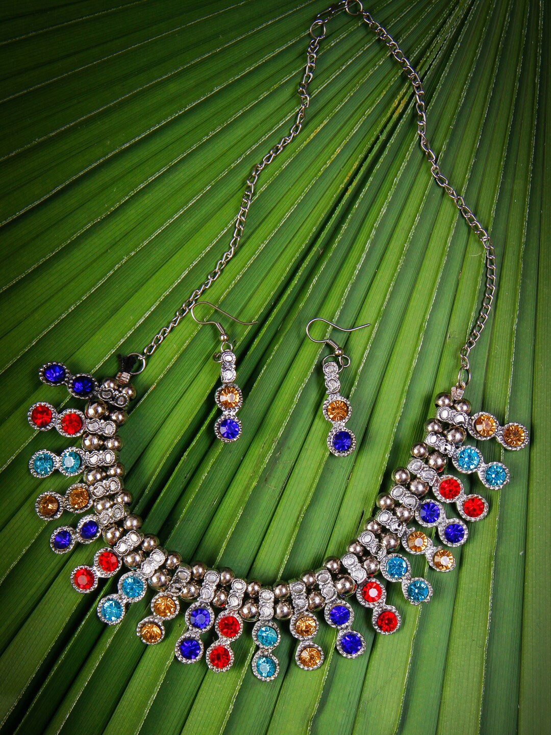 

Rang Gali Silver-Plated German Silver Oxidized Crystal Stone Studded Jewellery Set