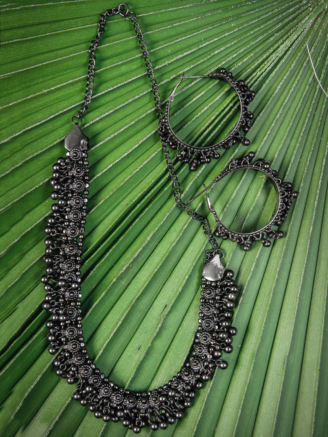 

Rang Gali Silver-Plated German Silver Oxidized Afghani Jewellery Set