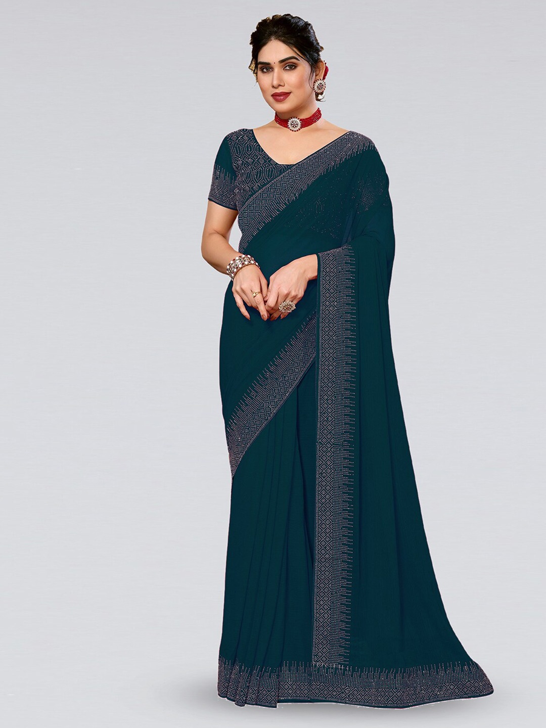 

Mitera Teal & Silver-Toned Embellished Beads And Stones Saree