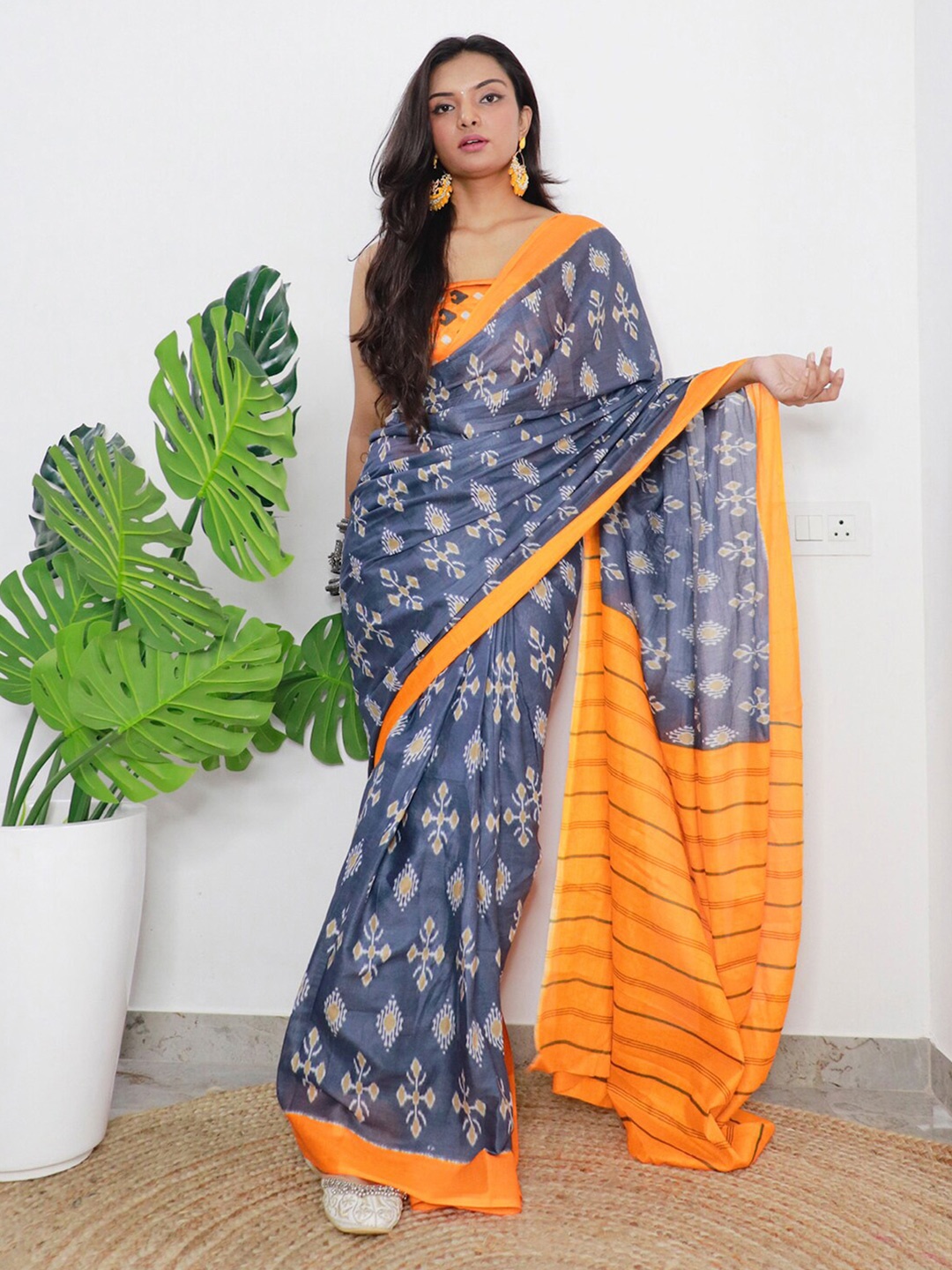 

Mitera Grey & Yellow Ethnic Motifs Printed Saree