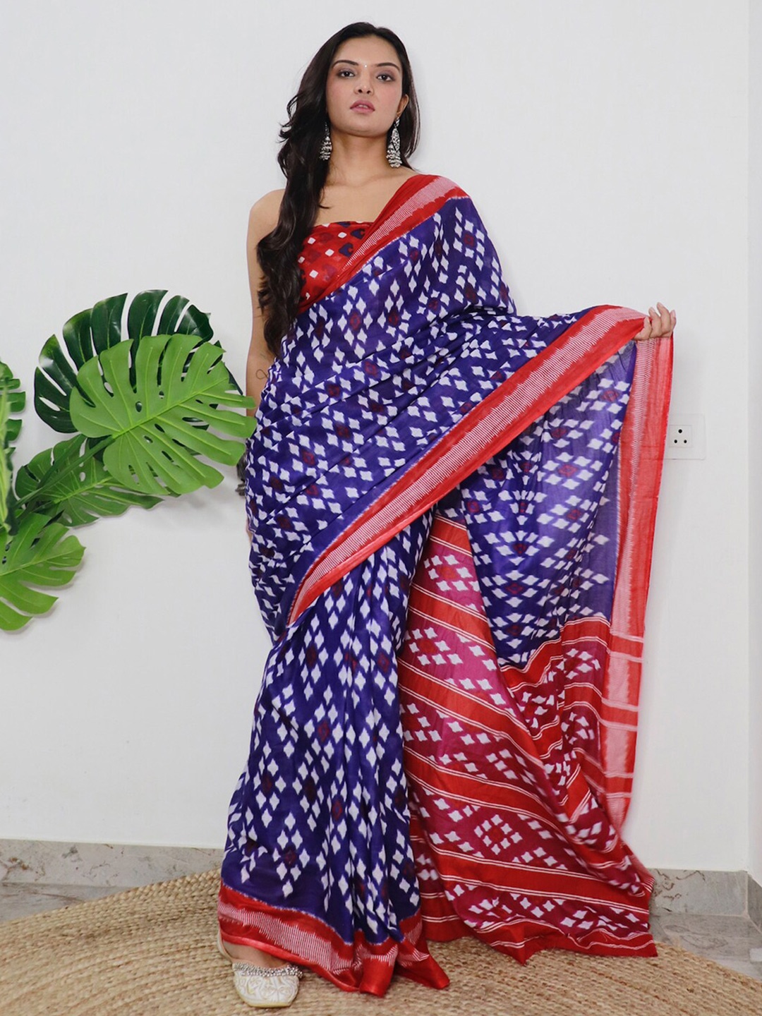 

Mitera Blue & Red Ethnic Motifs Printed Saree