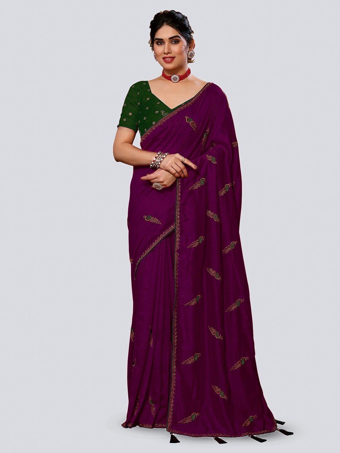 

Mitera Purple & Green Ethnic Motifs Embroidered Beads and Stones Saree