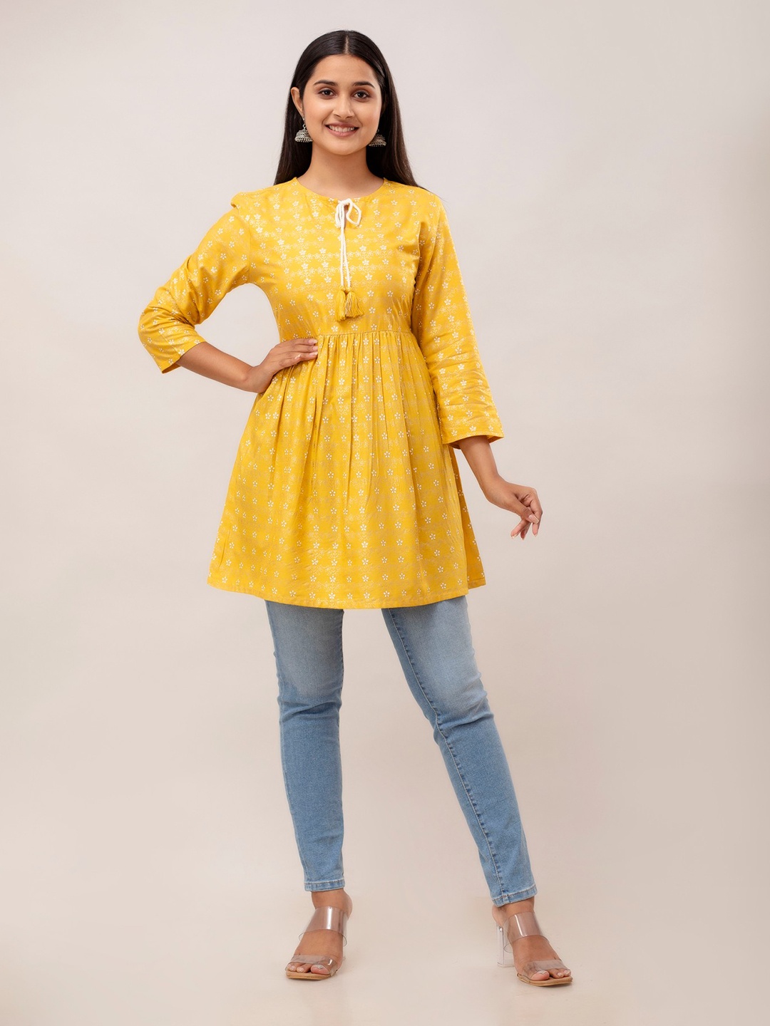 

HERE&NOW Yellow Ethnic Motifs Printed Keyhole Neck Pleated A-Line Kurti