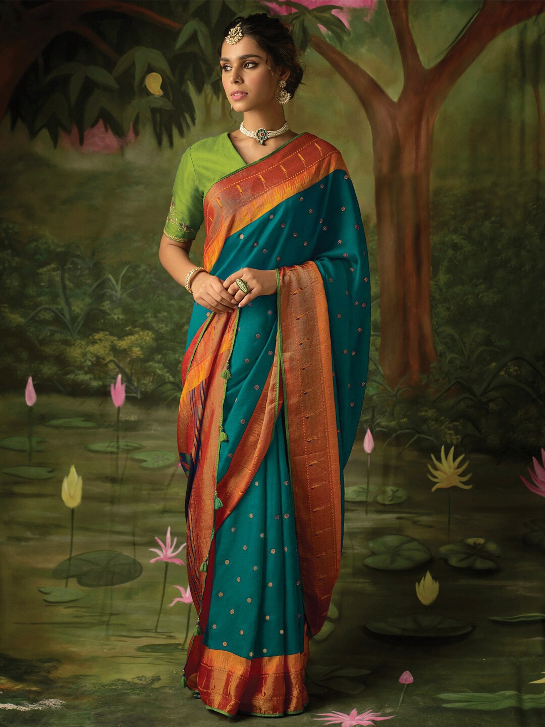 

Mitera Floral Woven Design Brasso Ikat Saree, Blue