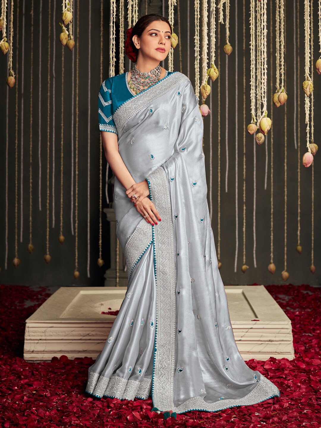 

Mitera Grey & Teal Ethnic Motifs Embroidered Satin Saree