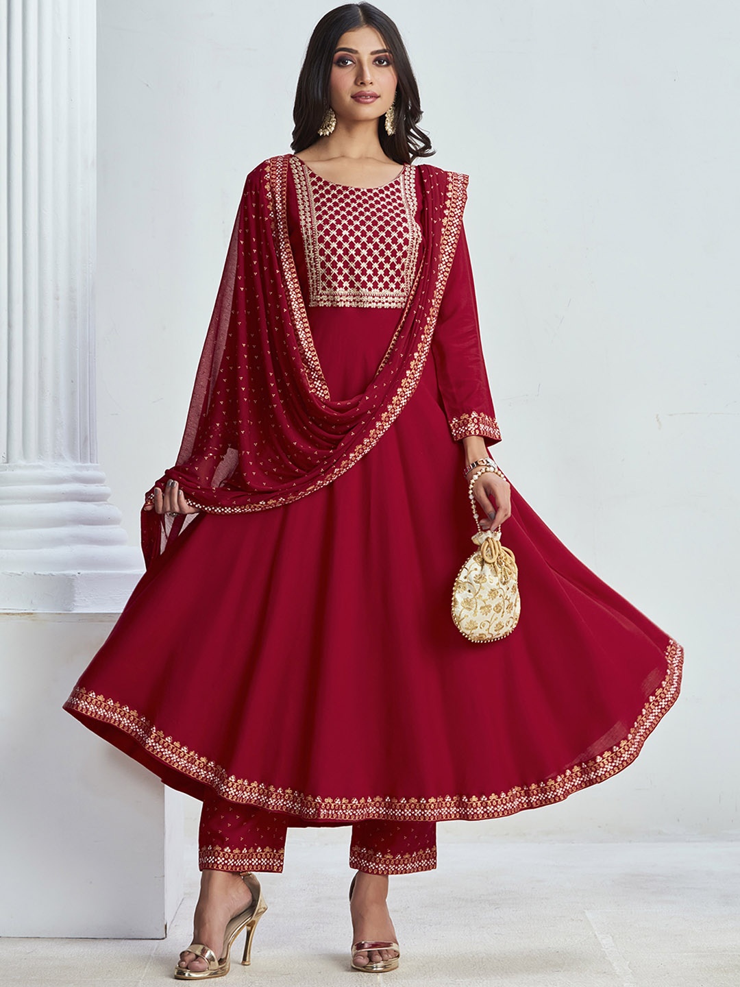 

Sangria Maroon Ethnic Motifs Yoke Design Embellished Kurta With Trouser & Dupatta