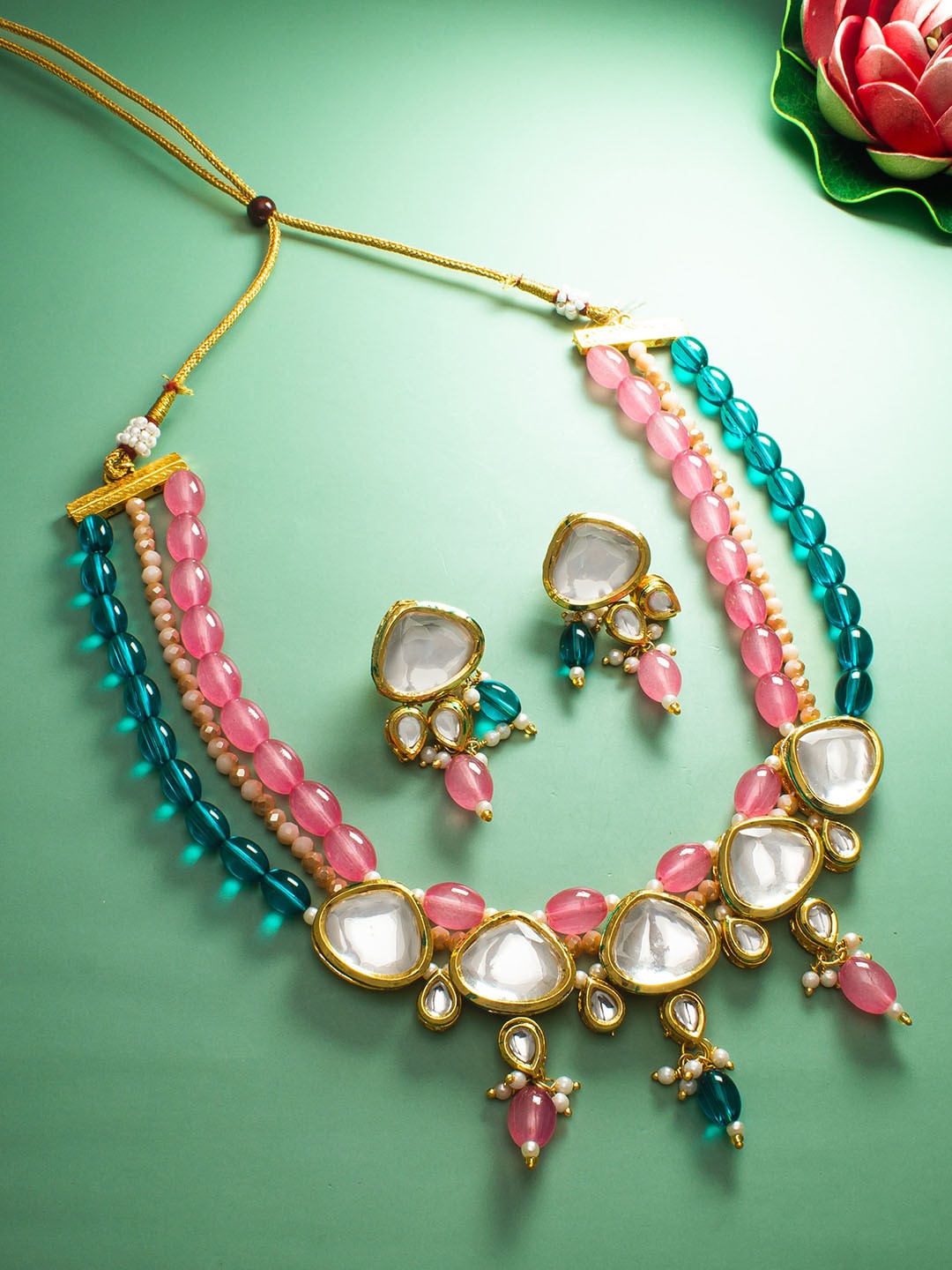

aadita Gold Plated Kundan Stone Studded & Pearls Beaded Jewellery Set, Silver