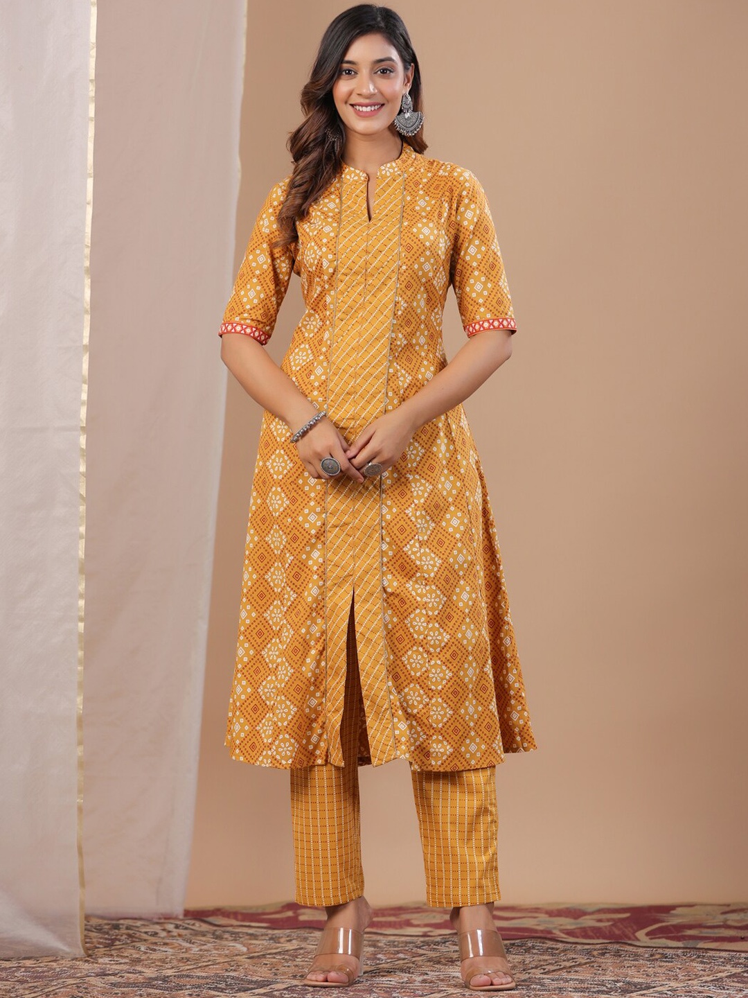 

Sangria Bandhani Printed Pure Cotton Kurta With Trousers, Mustard