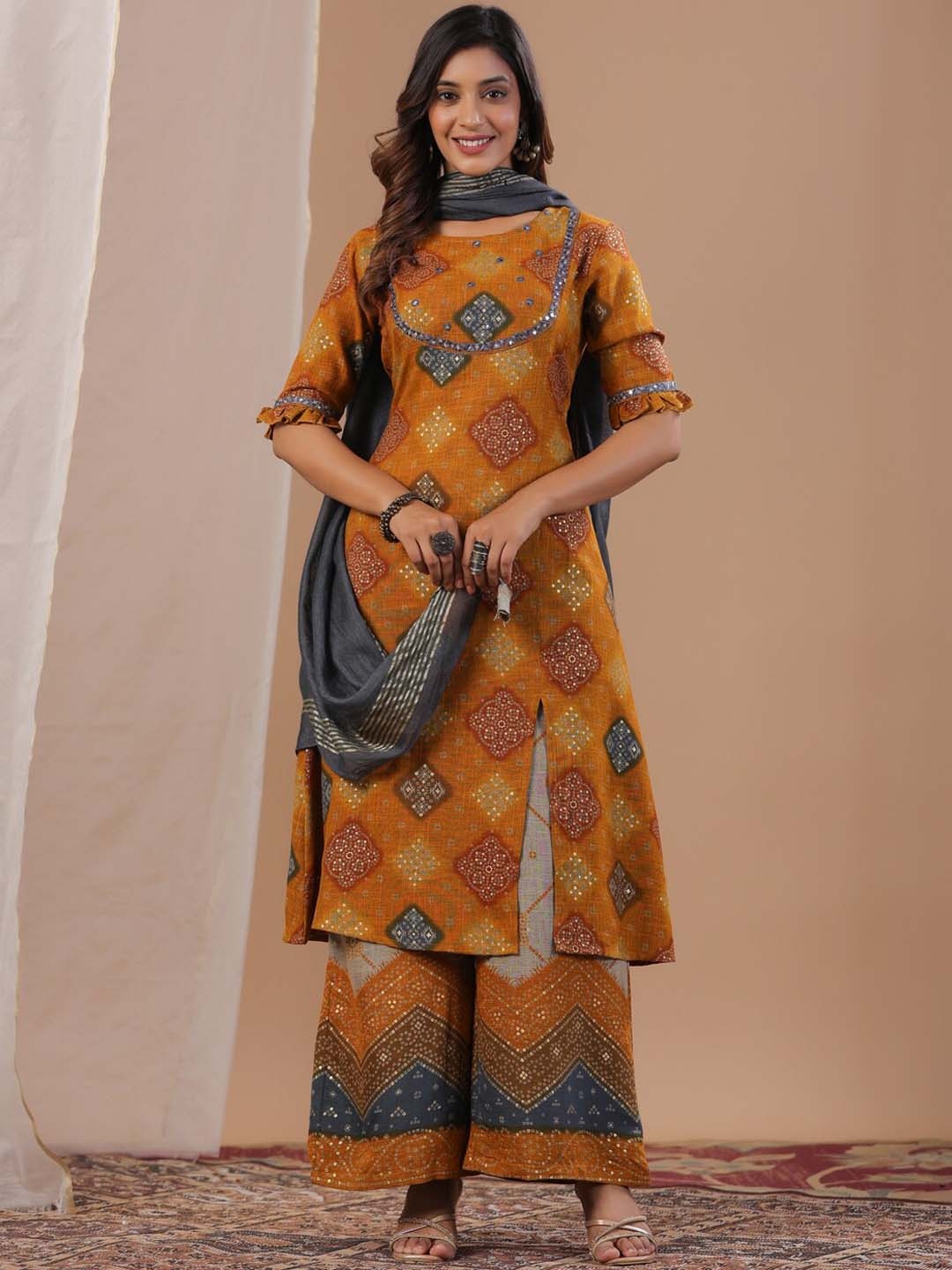

Sangria Ethnic Motif Printed A-Line Kurta With Trouser & Dupatta, Mustard