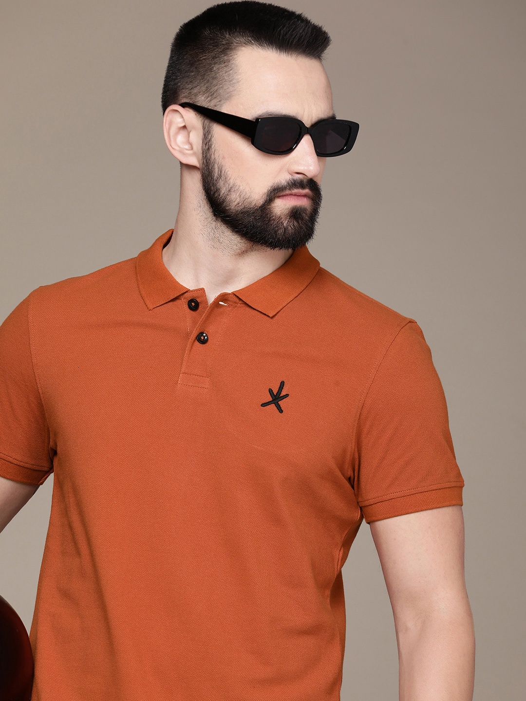 

The Roadster Life Co. Men Solid Minimal Embroidered Polo Collar Pure Cotton T-shirt, Rust