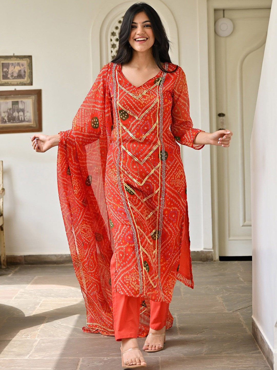 

Lavanya The Label Bandhani Printed Regular Gotta Patti Kurta with Trousers & With Dupatta, Orange