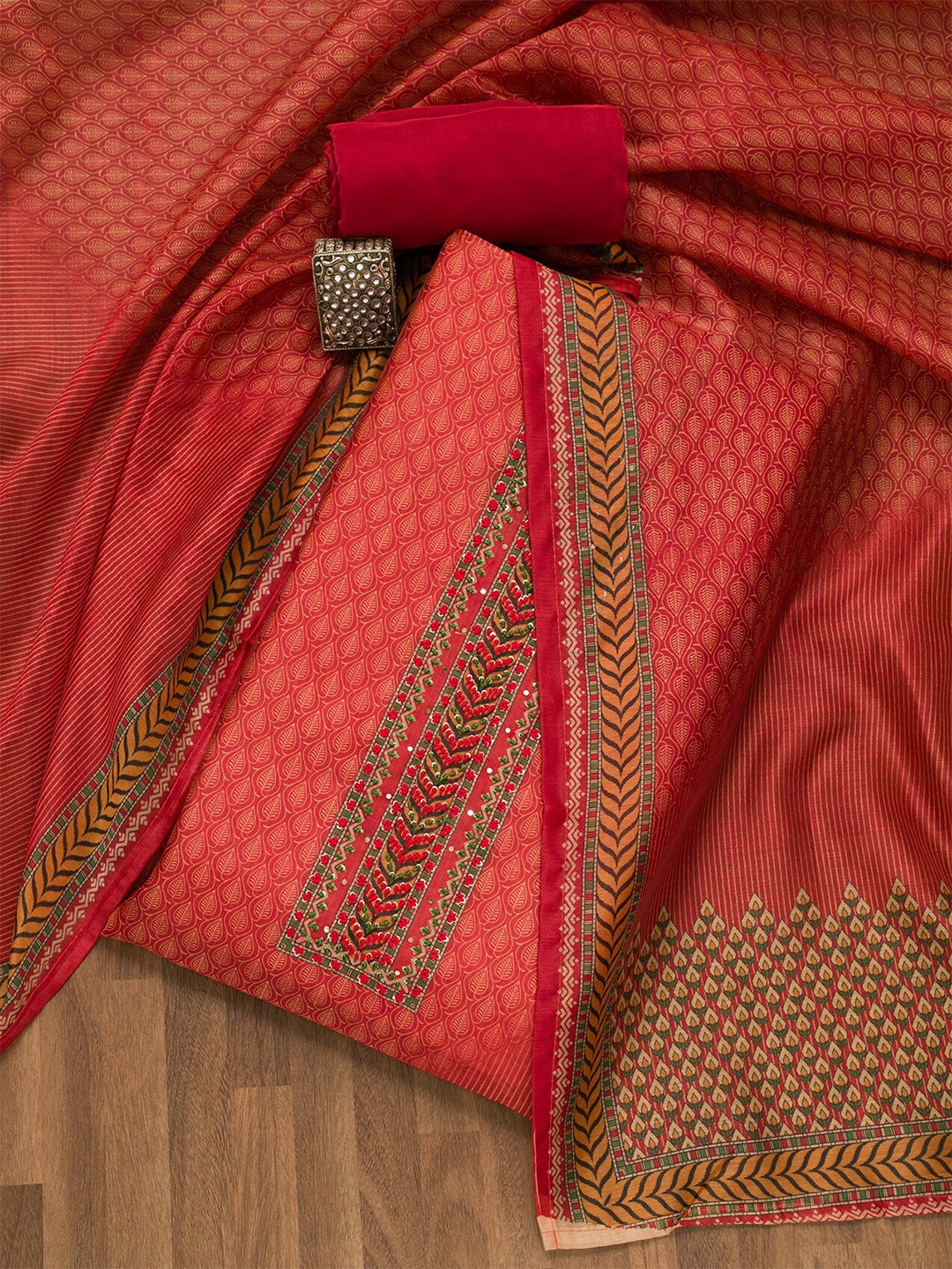 

Koskii Ethnic Motifs Printed Unstitched Dress Material, Rust