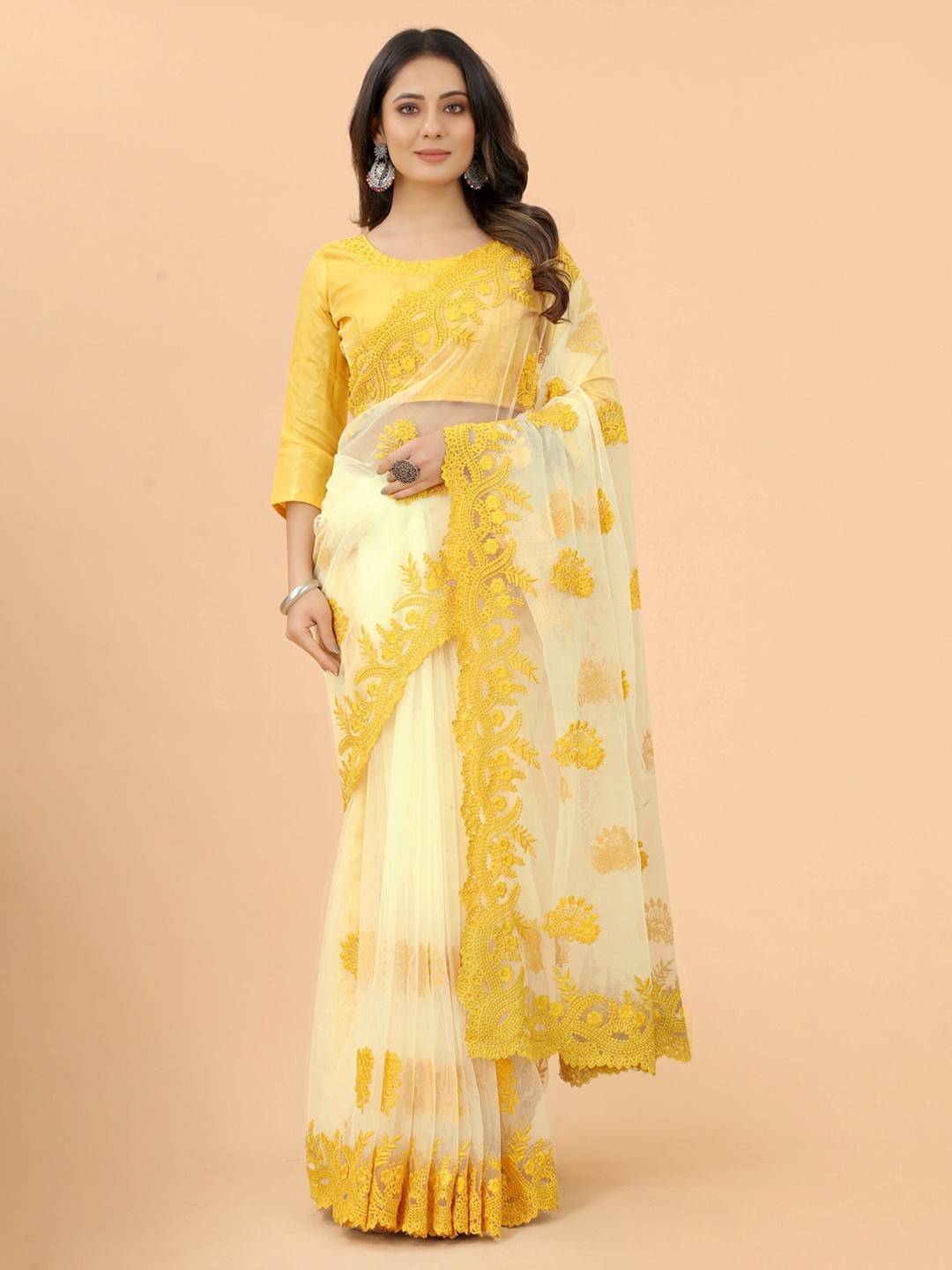 

Vaidehi Fashion Ethnic Motifs Embroidered Net Saree, Yellow
