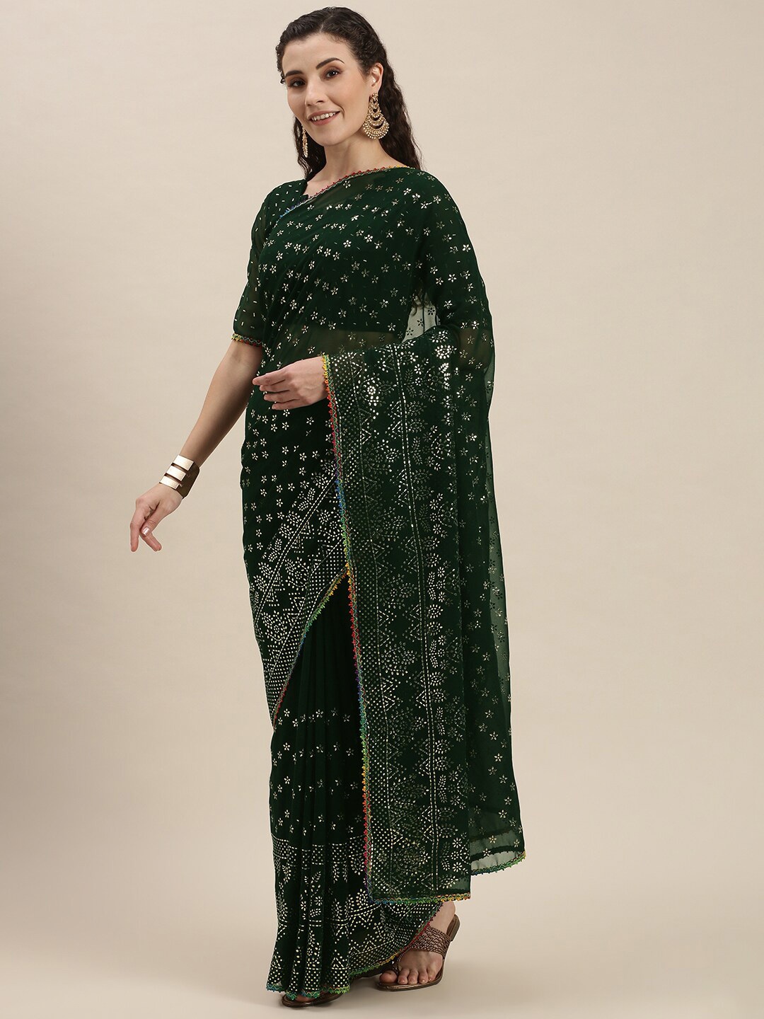 

Mitera Green & Black Embellished Embroidered Pure Georgette Saree